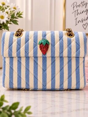 Kurt Geiger Kensington Blue and White Striped Shoulder Bag with Strawberry Charm